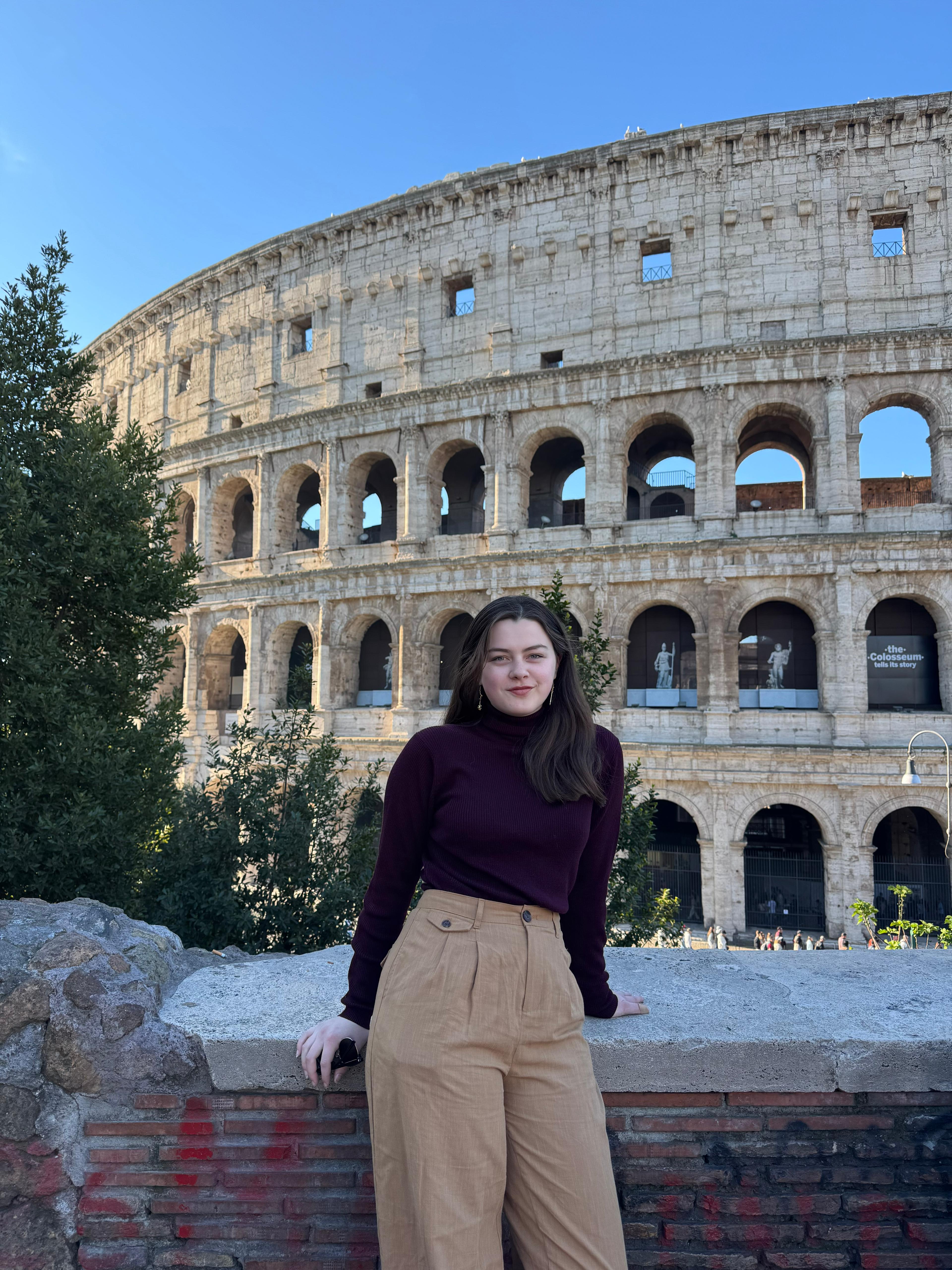 Catherine in front of the Colosseum